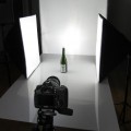 Configuration des éclairages au studio photo pour la la captation de bouteilles